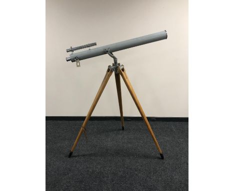 A 1920's chrome telescope with two lenses and 5' wooden tripod stand 