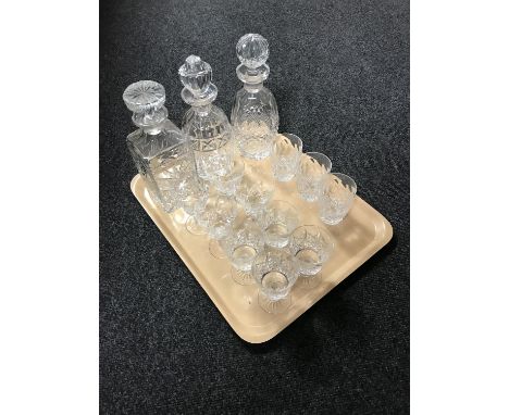 A tray of Waterford crystal decanter with associated stopper together with three Waterford crystal glasses, two further decan