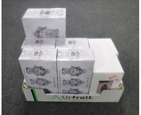 A box containing boxed ornaments to include five boxed Leonardo Collection silver art buddhas, pineapple, black skull, togeth