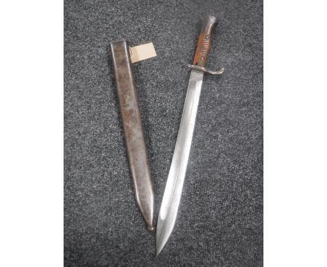 A WWII German bayonet stamped 'V.C. Schilling', in scabbard 