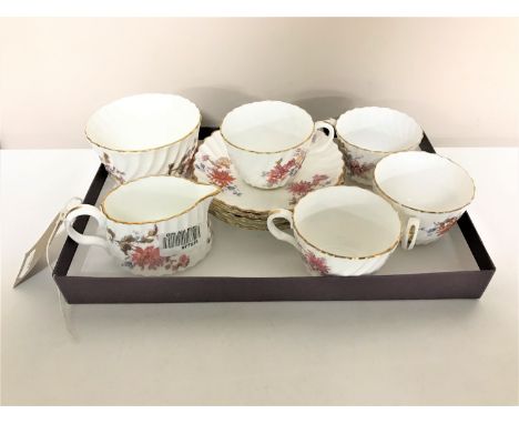 Ten pieces of antique Minton bone china with gilded detail, comprising sugar basin, milk jug, four cups and four saucers