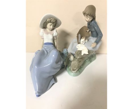 Two Nao figures of seated ladies 