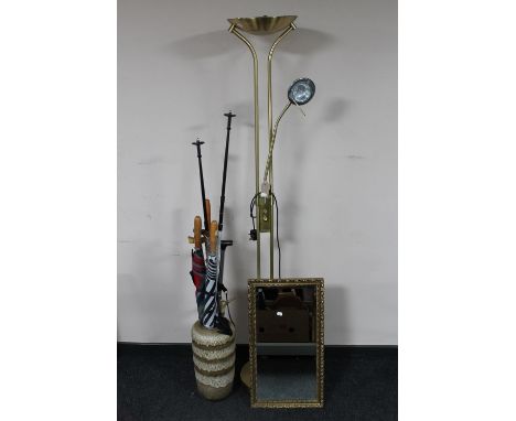 A brass uplighter together with a gilt framed mirror and a West German stick stand containing assorted walking sticks, umbrel