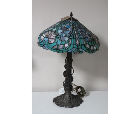 A Tiffany style table lamp with leaded glass shade 