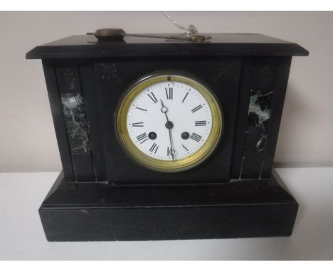 A Victorian slate and marble mantel clock with enamel dial, with pendulum and key