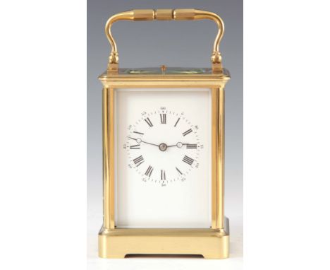 A LATE 19th CENTURY FRENCH CORNICHE CASED REPEATING CARRIAGE CLOCK the brass case enclosing a 6.5cm porcelain dial with Roman