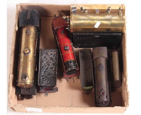 A COLLECTION OF VINTAGE O GAUGE TRAINS  including a clockwork locomotive and tender, an electric army supply train set, a ste