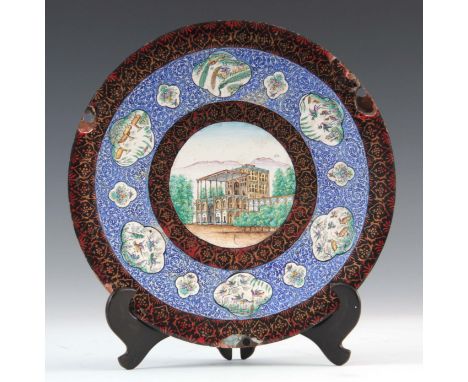 A 19TH CENTURY PERSIAN ISLAMIC ENAMEL PLATE with central painting of a temple surrounded by panels of birds, deer and rabbits
