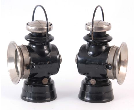 A PAIR OF BLACK LUCAS 724 'KING OF THE ROAD' OIL SIDE LAMPS with two-tier chimneys and loop handles 32cm high