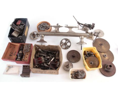 A VINTAGE STEEL WATCHMAKERS LATHE with wheel cutting attachments and various components  42cm wide