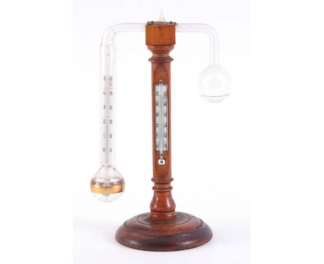 A 19th CENTURY BOXWOOD DANIEL'S DEW POINT HYGROMETER  having a turned stand with calibrated thermometer scales 24.5cm high