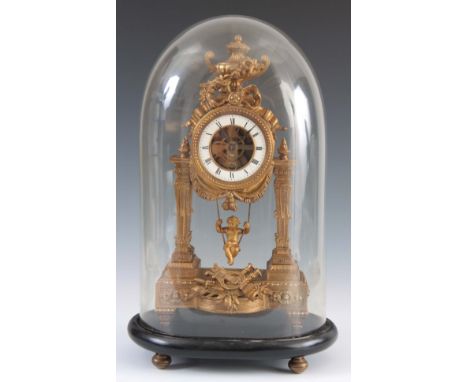 A LATE 19th CENTURY FRENCH SWINGING CHERUB MANTEL CLOCK with skeletonised porcelain dial fronting an eight-day spring driven 