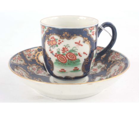 A First Period Blue Scale Polychrome Worcester CABINET CUP and SAUCER&nbsp;with finely painted scrolled gilt edged floral and