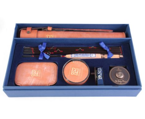 A BOXED PRESENTATION FLY FISHING SET  'THE COMPLETE ANGLERS' BY THE HOUSE OF HARDY comprises a Hardy Graphite Smuggler Deluxe