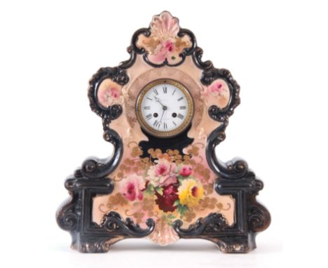 A LATE 19th CENTURY PORCELAIN MANTEL CLOCK with painted floral decoration enclosing a 3.5" porcelain dial fronting a French e