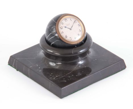 AN EARLY 20th CENTURY NOVELTY ZENITH NERO MARQUINA MARBLE DESK CLOCK the spherical marble case enclosing a 45mm silvered dial