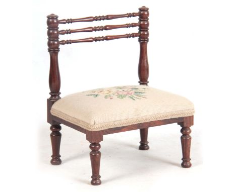 A LATE 19TH CENTURY ROSEWOOD SPINDLE TURNED CHILDS CHAIR with tapestry seat 32cm wide 41cm high.