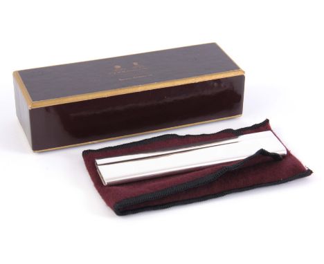 A SILVER AND FAUX TORTOISESHELL PENHALIGON'S COMB, in original box, 12.5cm long.