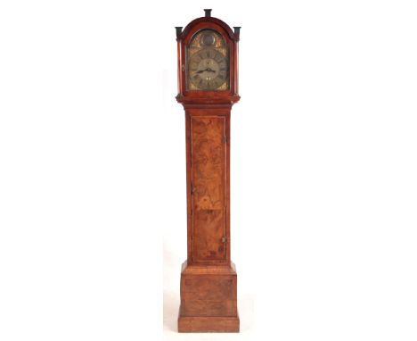 WILLIAM HARRIS, LONDON. AN EARLY 18TH CENTURY FIGURED WALNUT EIGHT-DAY LONGCASE CLOCK with a 12” archtop brass dial having wh