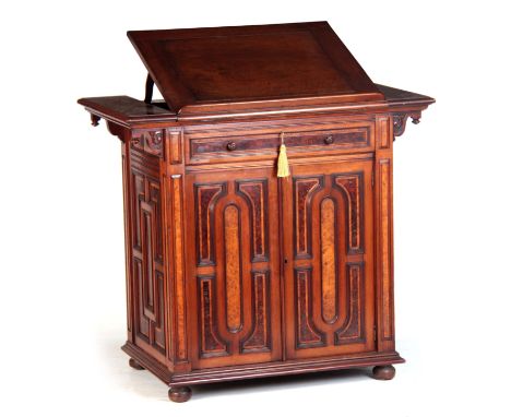 MACKENZIE AND MITCHELL, EDINBURGH. A GOOD QUALITY WALNUT BURR YEW-WOOD AND AMBOYNA PANELLED LIBRARY CABINET / FOLIO STAND wit