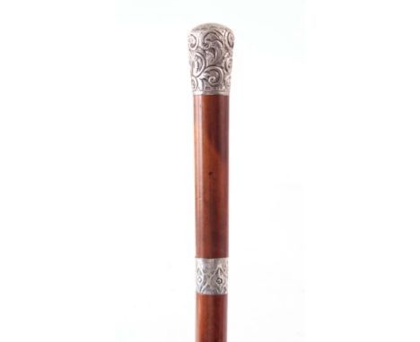 A LATE 19TH CENTURY MALACA SWORD STICK with a rococo silver pommel 90.5cm overall 