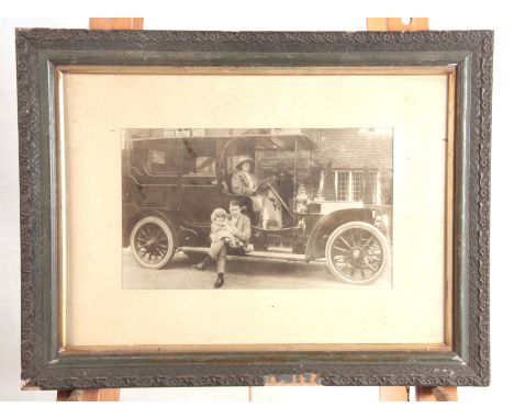 A LARGE EARLY 20th CENTURY PHOTOGRAPHIC PRINT OF A VINTAGE CAR 22cm high, 37cm wide  - mounted in a glazed frame