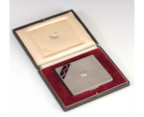 A SILVER AND ENAMEL CIGARETTE BOX IN ORIGINAL PRESENTATION CASE with engine turned finish and applied crown to centre and gil