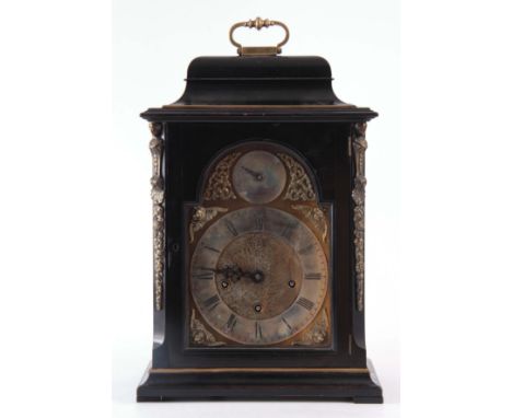 A LATE 19th CENTURY QUARTER CHIMING EBONISED BRACKET CLOCK the bell top case with brass caryatid mounts enclosing an 8" brass