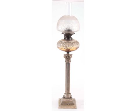 A LARGE LATE 19TH CENTURY SILVER PLATED CORINTHIAN COLUMN OIL LAMP, with cut glass reservoirs and shade with funnel 90cm high