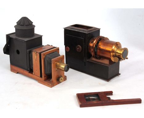 TWO 19TH CENTURY MAGIC LANTERN SLIDE PROJECTORS one part complete, sold with a slide of a river scene.