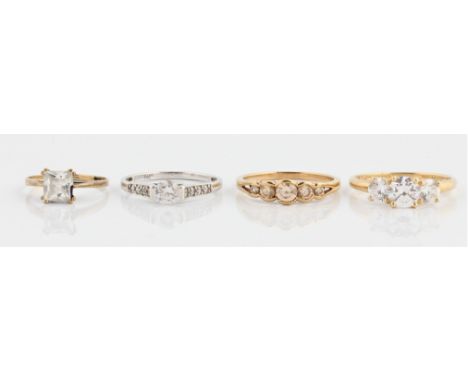Four colourless stone rings, three hallmarked 9ct gold, the other unmarked yellow metal, ring sizes J-T. IMPORTANT: Online vi