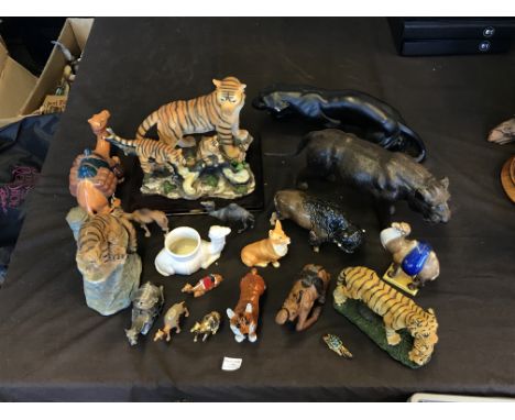 A selection of various animal figurines to include Goebel dog, Juliana Collection tiger family, camels, jaguars, etc. IMPORTA