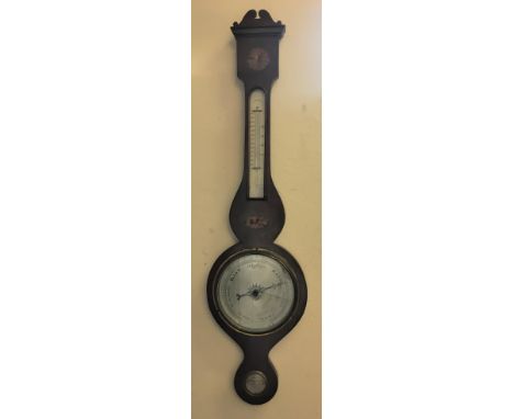A mahogany cased barometer with inlay detail to top and centre, approx. height 99cm. IMPORTANT: Online viewing and bidding on