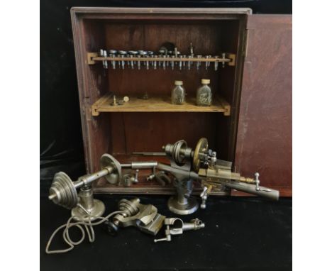 A Lorch Schmidt watchmakers lathe in mahogany box with tool head accessories.&nbsp;IMPORTANT: Online viewing and bidding only