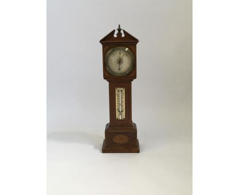 A mahogany cased Rowley&amp;Son barometer in the form of a miniature grandfather clock, 42cm IMPORTANT: Online viewing and bi
