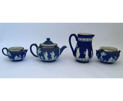 A selection of Wedgwood jasperware, two jugs, bowl and teapot. IMPORTANT: Online viewing and bidding only. Collection by appo