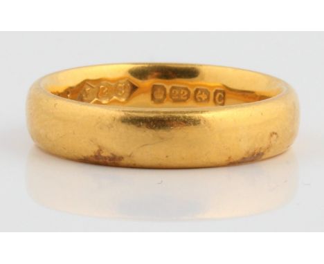 A hallmarked 22ct wedding band, ring size L, approx. weight 6.4g.&nbsp;IMPORTANT: Online viewing and bidding only. No in pers
