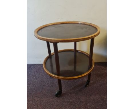 An Alpha-Roller Austria two tier round tea trolley. IMPORTANT: Online viewing and bidding only. Collection by appointment via