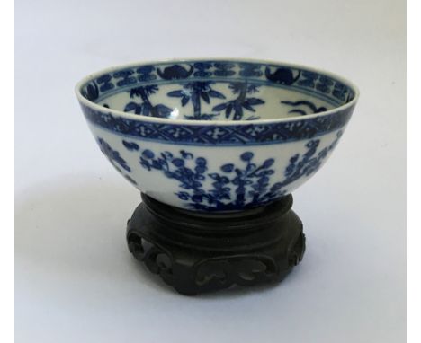 A Chinese blue and white bowl with dragon to centre, characters marks to base Kangxi dynasty, diameter 12.5cm. IMPORTANT: Onl