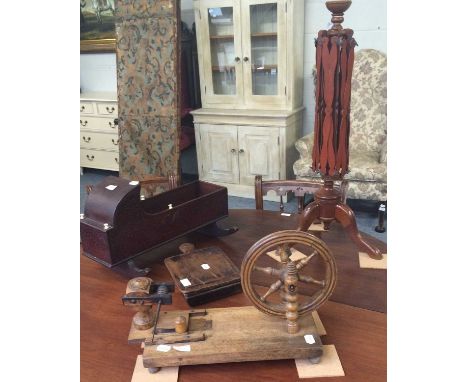 Late 19th century wool winder on tripod base, another on rectangular base, a treen box and cover with hinged cover and a doll