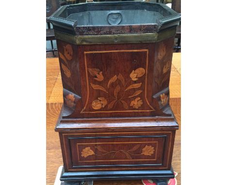 A 19th-century satinwood inlaid mahogany planter, the canted square ebonized molded rim over a brass mounted band above a squ