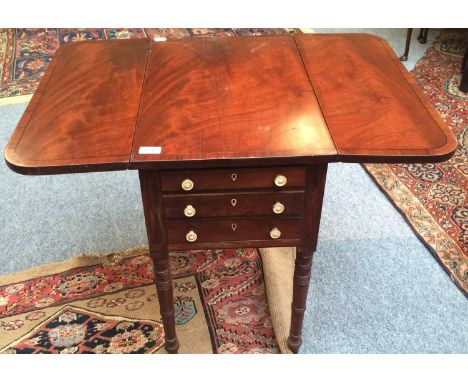 An early 19th-century cross banded mahogany dropleaf table fitted with three drawers 83cm (open) by 56cm by 69cm, together wi