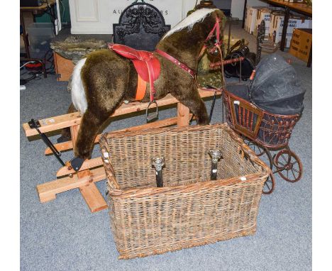 A 20th century plush rocking horse of tressle base; together with a Victorian wicker doll's tram, a wicker hamper and two dou