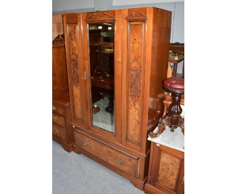 A Victorian four-part mahogany and burr walnut bedroom suite, comprising mirror-front wardrobe (lacking cornice), tile-backed