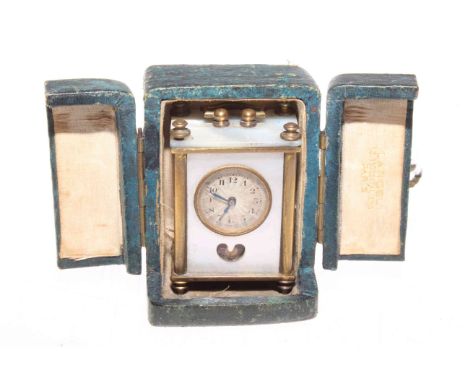 Early 20th Century brass and mother-of-pearl miniature carriage clock, in a fitted case, signed Lancel, Paris
