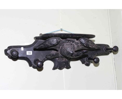 19th Century carved oak eagle wall bracket, with four coat pegs