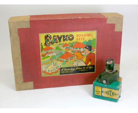 A Bayko building set, No. 4, original box, together with a Astra Searchlight (2) 