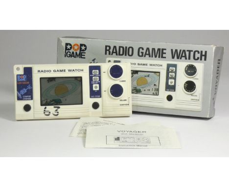 A Matsushima Kogyo Radio Game Watch (Voyager) single screen handheld game c.1980s (model number MG 382 A)In original box, wit