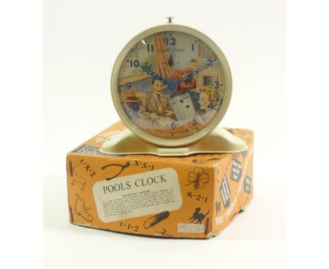 A Smiths Pools alarm clock, with automated face depicting a couple making pools selections, with original box 