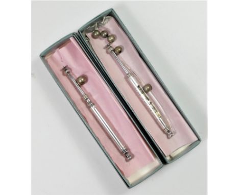 A silver limited edition lace makers bobbin, by Kenneth Taylor for Luton Museum, London 1981, to commemorate Charles and Dian